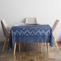 Blue geometric tablecloth on dining table with CABO VERDE print