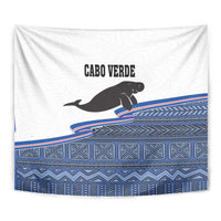Cape Verde manatee tapestry close view: black silhouette, blue geometric bands on white