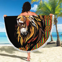 Round lion beach blanket, black with colorful border stripes and white fringe edge