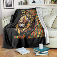 Black lion throw blanket draped over couch with colorful patterned side panel