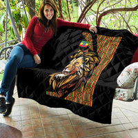 Black quilt with diamond quilting and lion graphic with vibrant vertical patterns
