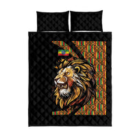 Black quilt bed set with centered lion face design, colorful geometric stripe border, pillows