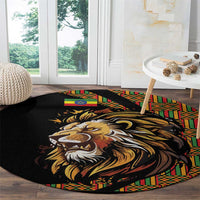 Black round carpet with lion portrait graphic and colorful geometric stripe border