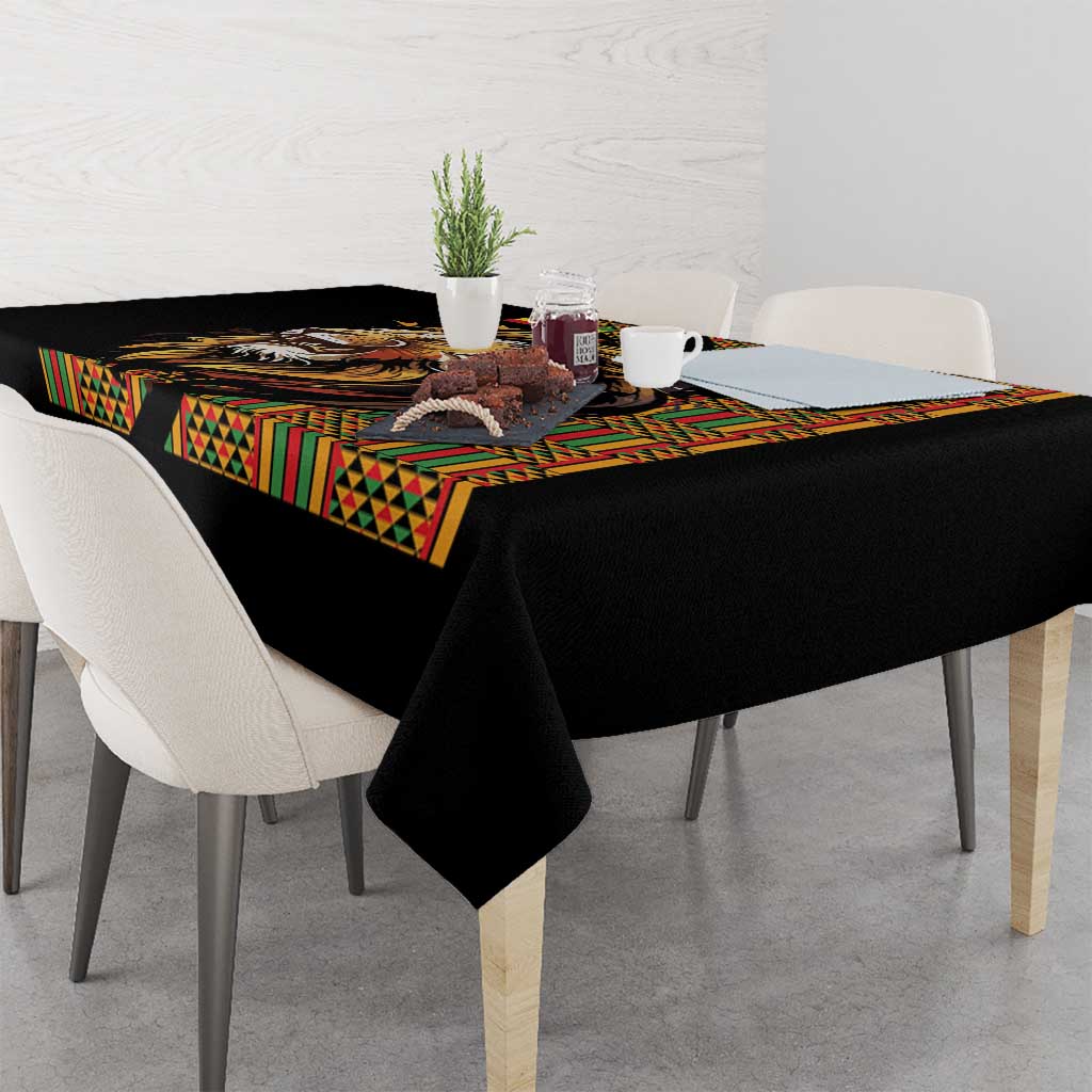 Black tablecloth with colorful Ethiopian-style panel border and lion artwork on table