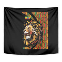 Black lion tapestry close-up with colorful Ethiopian patterned panel and lion face