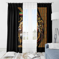 Black window curtain with lion face panels and colorful patterned center stripe