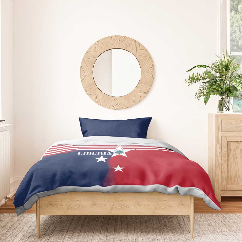 Liberia flag duvet with red, blue, and white stripes and stars; two-tone blue pillow shams