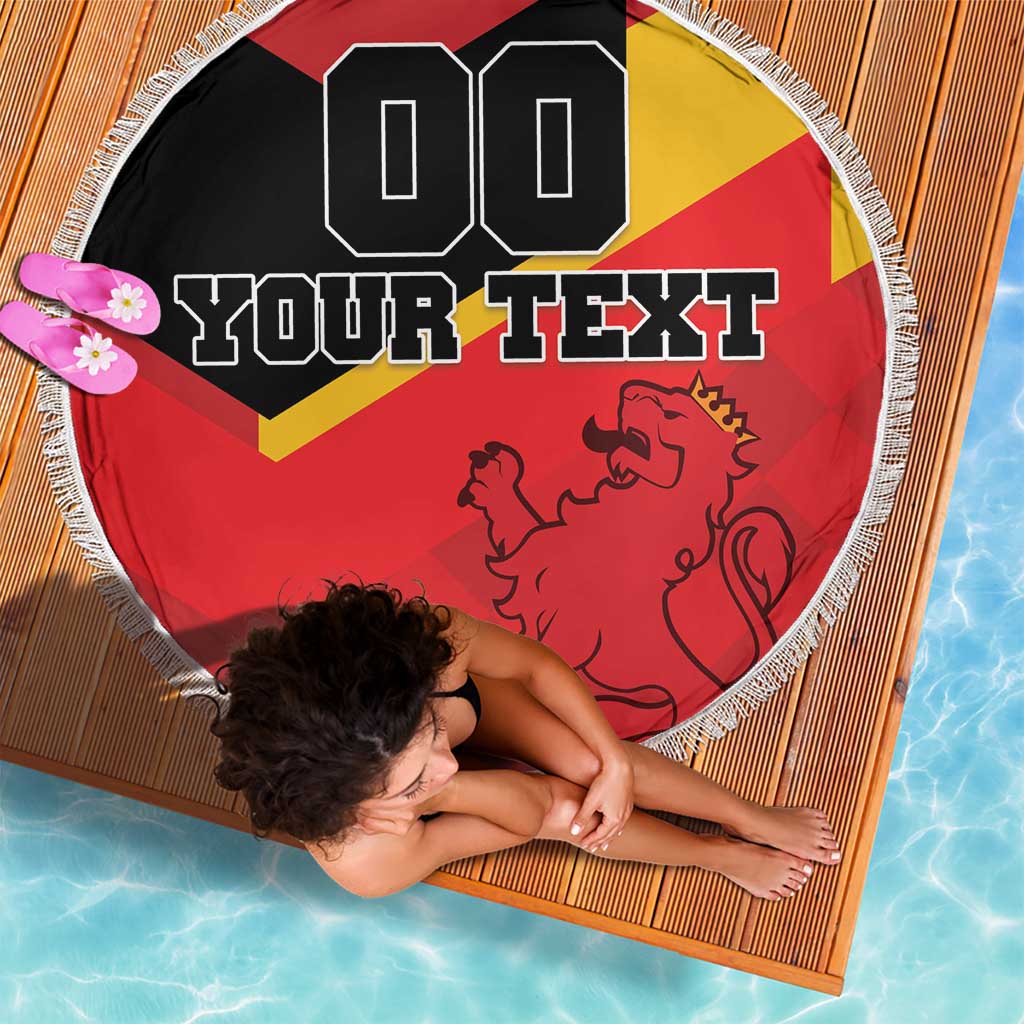 Round beach blanket showing Spain flag red-yellow with lion and custom text, tassel fringe