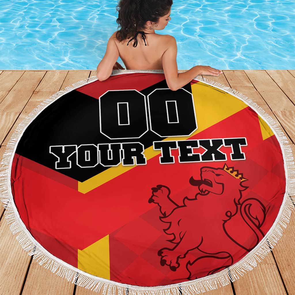 Round beach blanket with Spain flag colors, lion graphic and custom text, fringed border