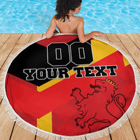 Round beach blanket with Spain flag colors, lion graphic and custom text, fringed border