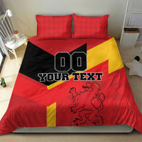 Red and black Spain flag bedding set with yellow diagonal stripe, lion crest, and two pillowcases.