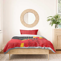 Red Spain flag bedding set with yellow stripe and lion crest, styled on single bed with pillowcase.