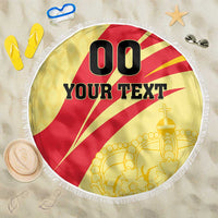 Round beach blanket with red-and-yellow rays, 'YOUR TEXT' and fringed edge