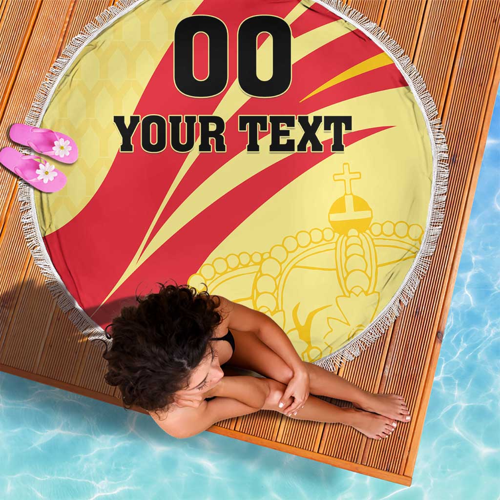 Round beach blanket with 'YOUR TEXT' and red-and-yellow design, fringed edge