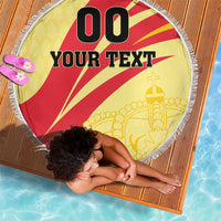 Round beach blanket with 'YOUR TEXT' and red-and-yellow design, fringed edge