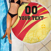 Round beach blanket with 'YOUR TEXT' and red rays, fringed border held up