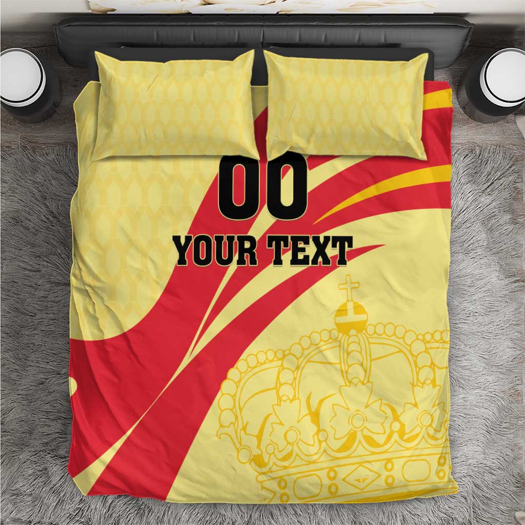 Yellow/red football bedding set with crown art; black '00' and 'YOUR TEXT' on duvet.