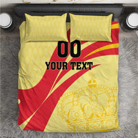 Yellow/red football bedding set with crown art; black '00' and 'YOUR TEXT' on duvet.