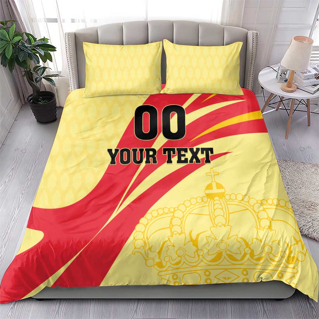 Yellow/red football bedding set with crown art, black '00' and 'YOUR TEXT'.