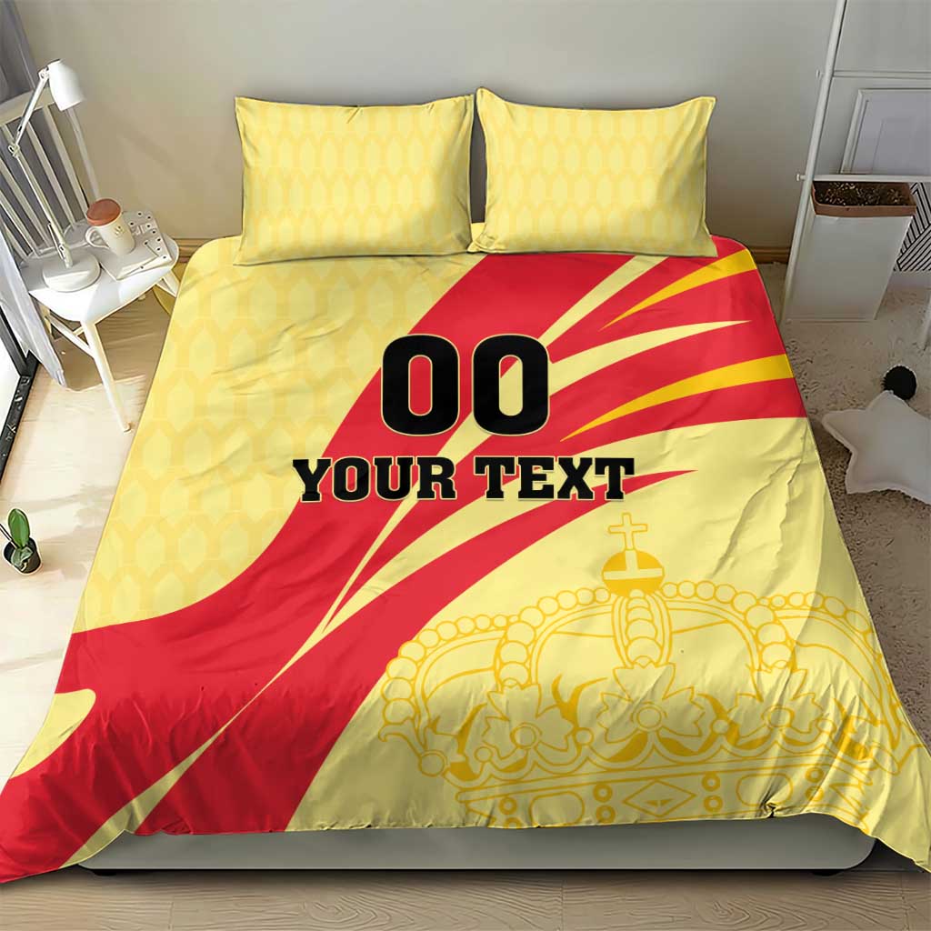 Yellow/red football bedding set with crown art and black '00 YOUR TEXT' center design.
