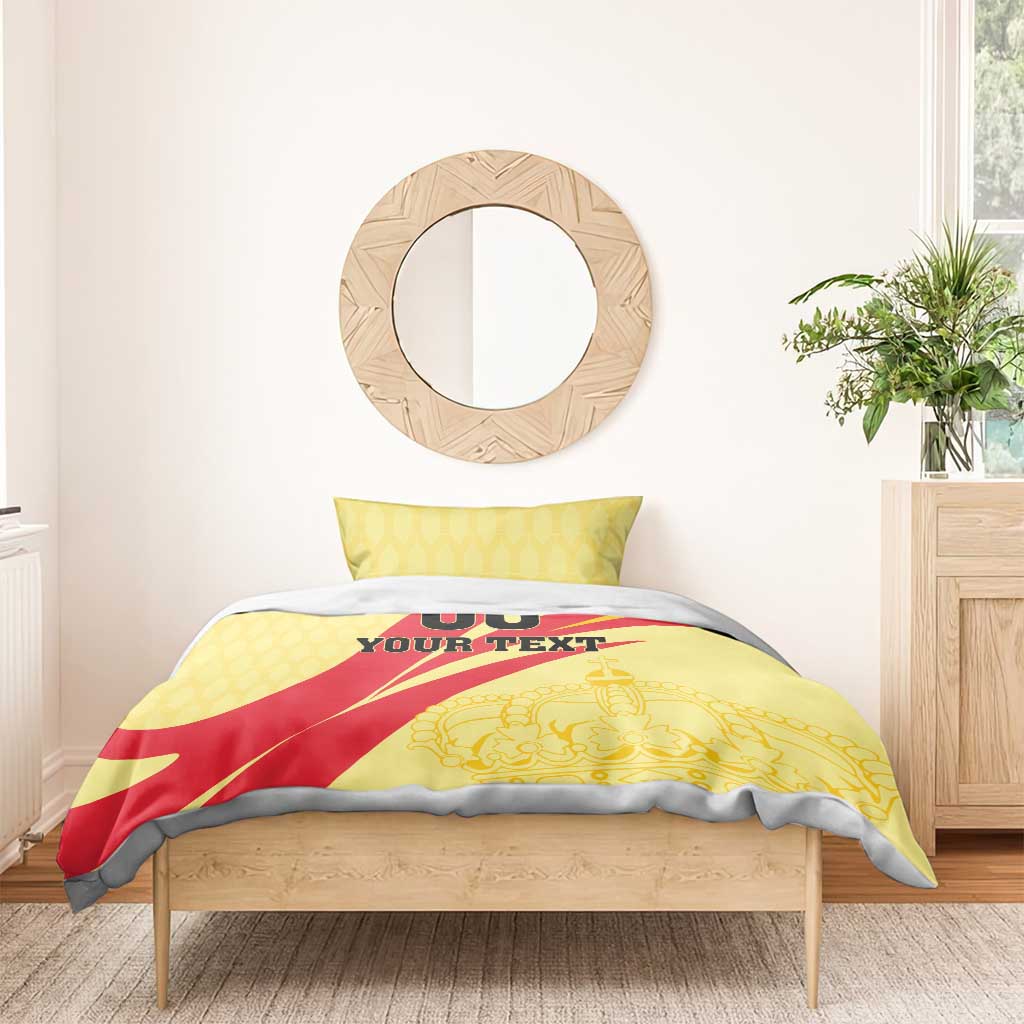 Yellow/red football bedding set with crown art and black '00 YOUR TEXT' on duvet.