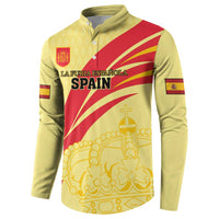 Yellow sweatshirt with button placket, front “SPAIN” text, red diagonal stripe, and crown icon.
