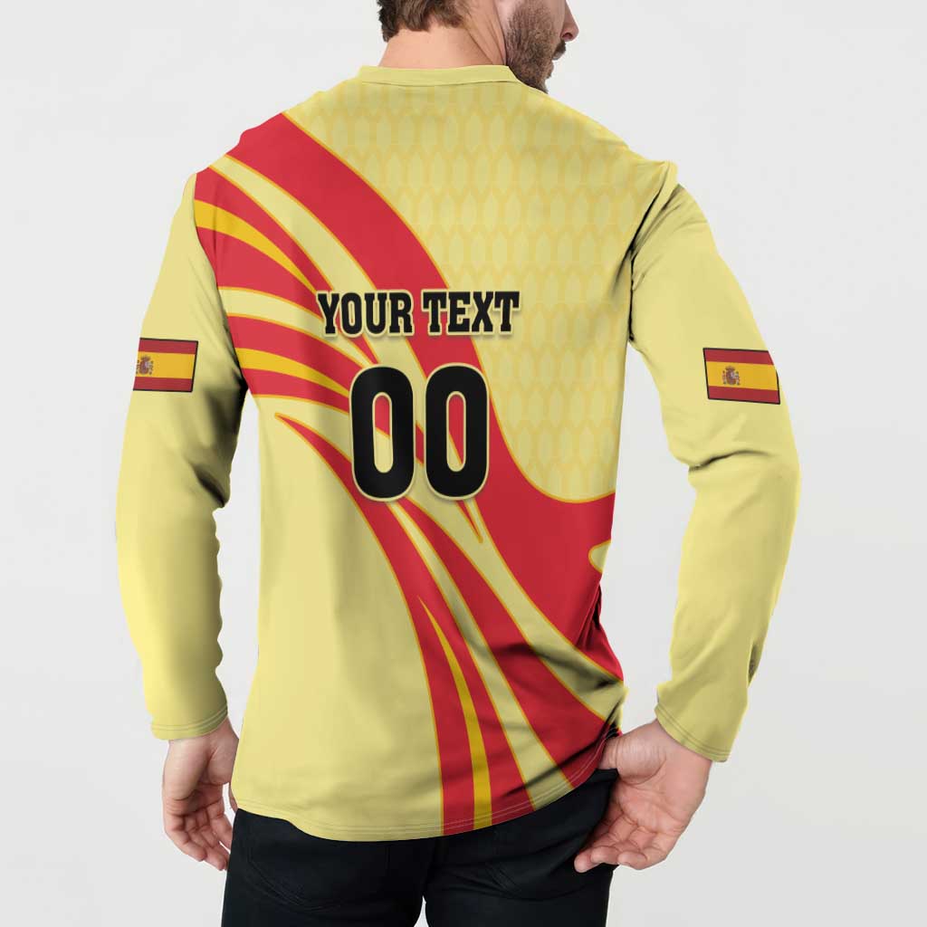 Yellow sweatshirt with button placket, back graphic with red diagonal stripes and large “00”.