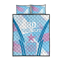 Blue quilt bed set with two pillows; pink star and diagonal pattern, "YOUR TEXT"