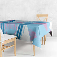Blue football tablecloth draped on table with pink and dark blue striped design