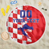 Round red, white, and blue beach blanket with checkerboard and Croatia map graphic