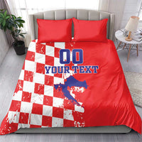 Red and white checkerboard duvet bedding set with red pillows and blue "DO YOUR TEXT" lettering
