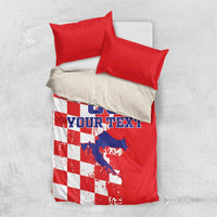 Red duvet and red pillows with white checkerboard left panel and blue "DO YOUR TEXT" graphic