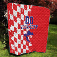 Red quilt with white checkered side, blue Croatia map, and '00 YOUR TEXT' print