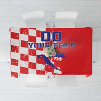 Red tablecloth with grunge checkerboard flags and map graphic for custom text