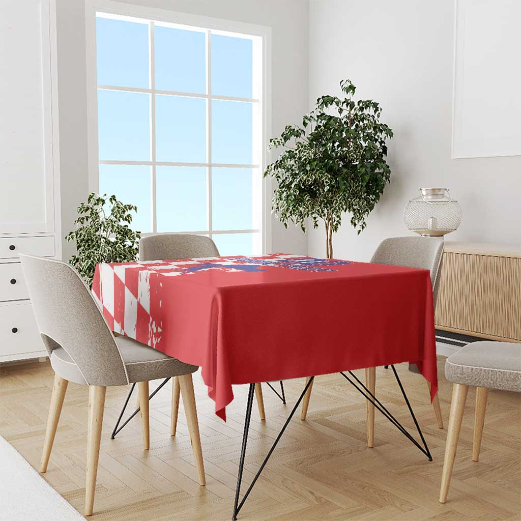 Red custom tablecloth with grunge checkerboard and map print over dining set