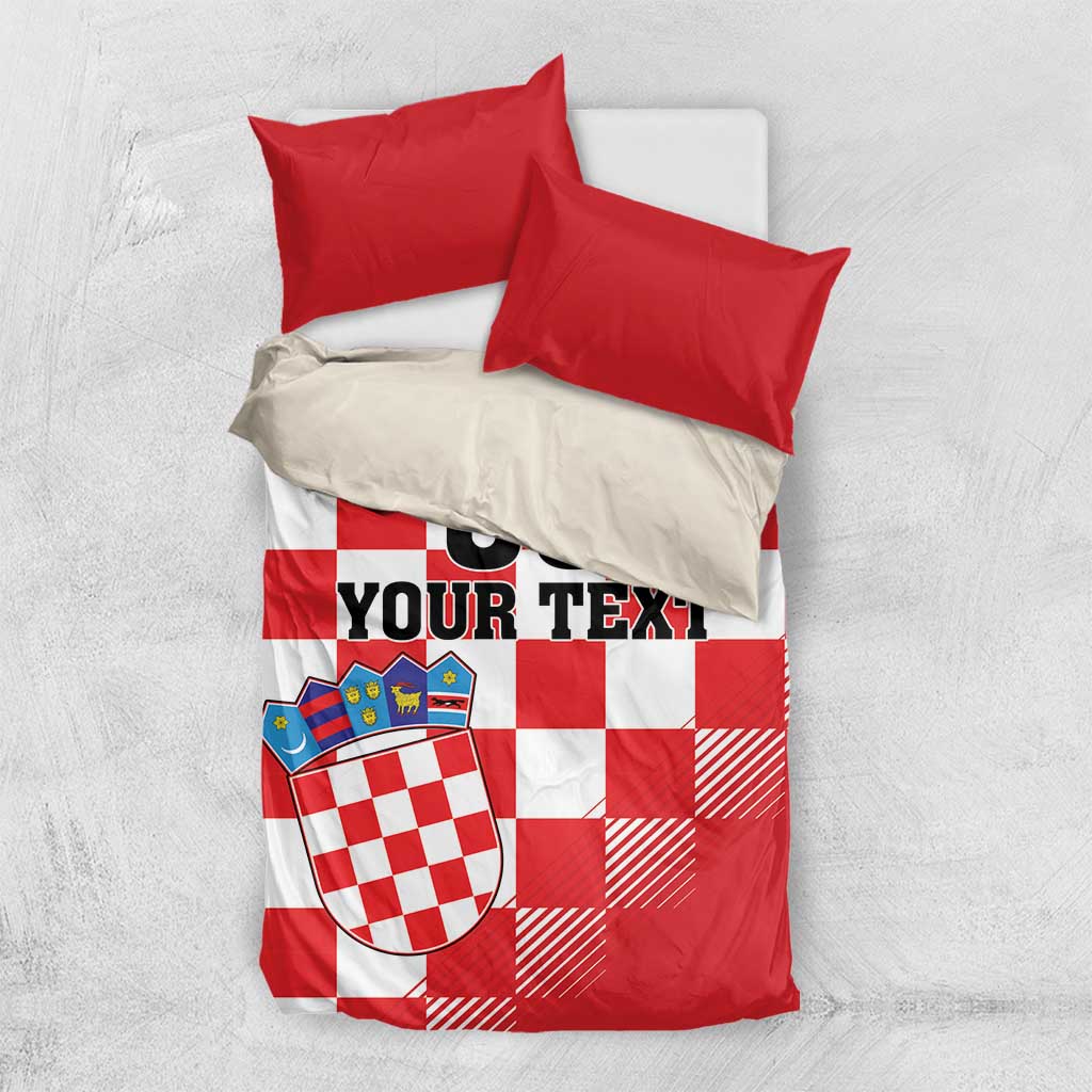 Red and white checkered bedding set with crest shield, “00 YOUR TEXT” on duvet