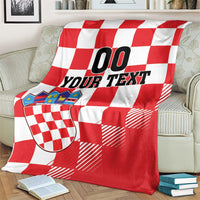 Croatia checkerboard custom blanket draped over couch, red and white checks, crest, “00 YOUR TEXT”