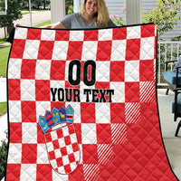 Red and white checkerboard quilt with coat of arms emblem and 'YOUR TEXT' print