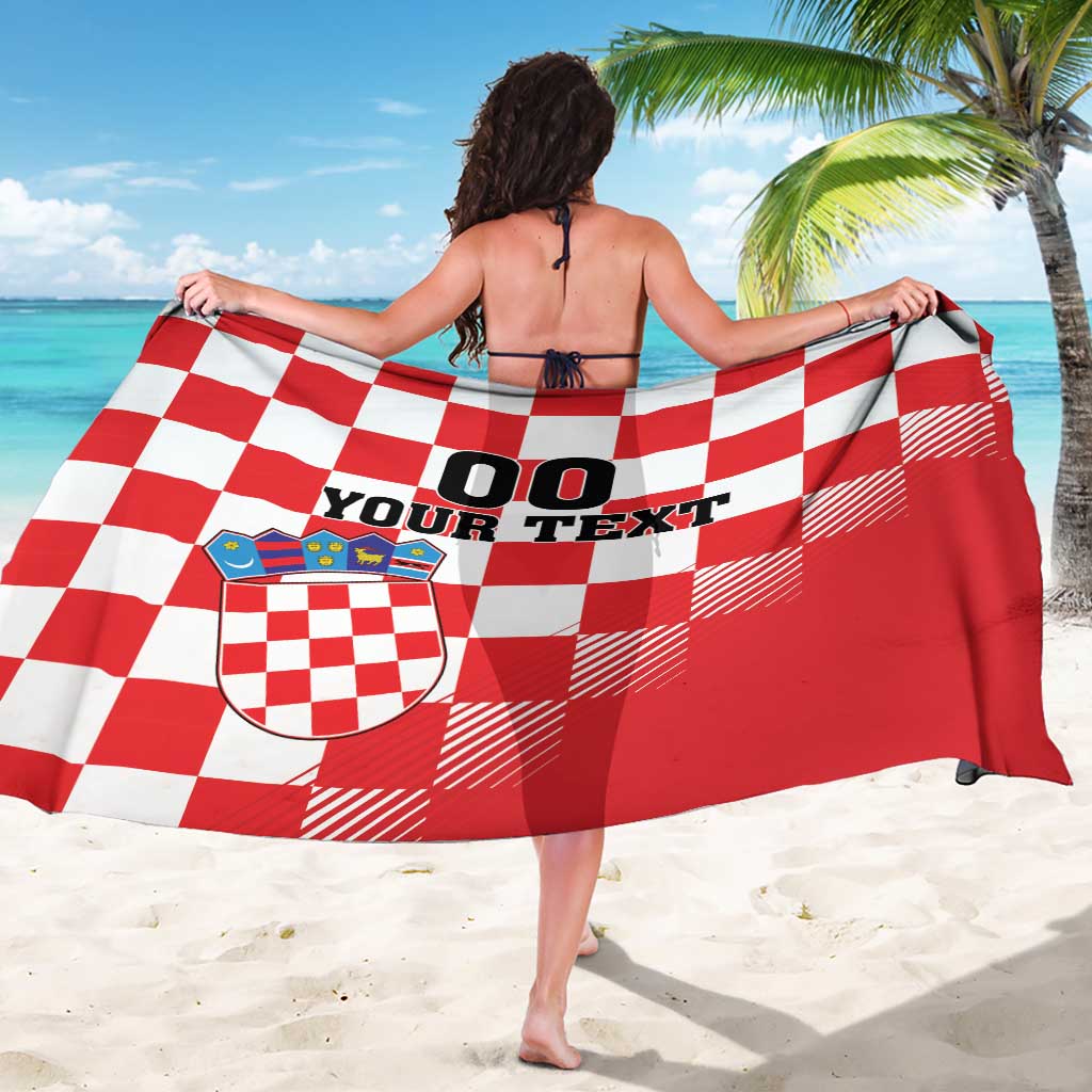 Custom red/white checkerboard sarong with coat of arms shield and 'YOUR TEXT' print