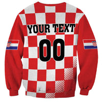 Red checkerboard sweatshirt with 'YOUR TEXT' and large '00' back print, long sleeves