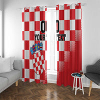 Red and white check curtains on a rod, featuring coat of arms and custom text panels