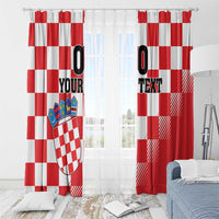 Red and white checkerboard curtain set with coat of arms crest and custom text, bedroom view