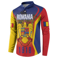 Blue button sweatshirt with Romania crest and 1918 graphic, three-quarter front view