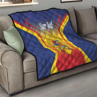Blue quilt throw on sofa with Romanian crest, red and yellow diagonal stripes, diamond quilting