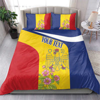 Flag-colored duvet set with 'YOUR TEXT' band, floral crest and two red-trim pillows
