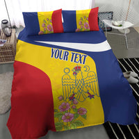 Flag-themed duvet set with 'YOUR TEXT' across center, yellow floral crest and pillows