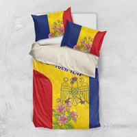 Flag-style bedding set with duvet and two pillows, floral crest and 'YOUR TEXT' print