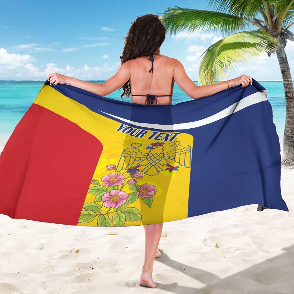 Personalized sarong draped over shoulders, navy/yellow/red with pelican and flower design