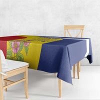 Personalized tablecloth with blue edge drape and yellow floral panel on dining table