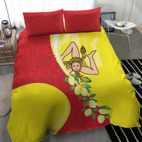 Bedding set featuring a red patterned side and yellow panel with Sicilian emblem